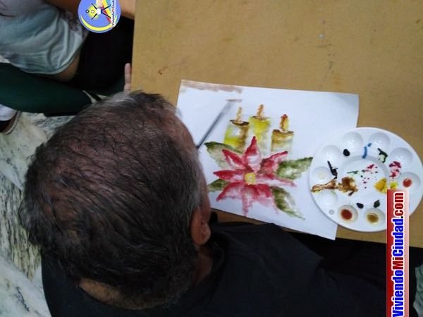 Joel Ramos en el Dia Munidal Pintor Boca y Pie